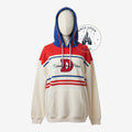 Once Upon Magic Disneyland Paris hooded sweatshirt in cream, red, and blue with a large D logo and front pocket.
