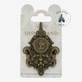 Once Upon Magic exclusive Disneyland Paris Hotel collector's pin, antique gold metal with ornate scrollwork and a central circular design.