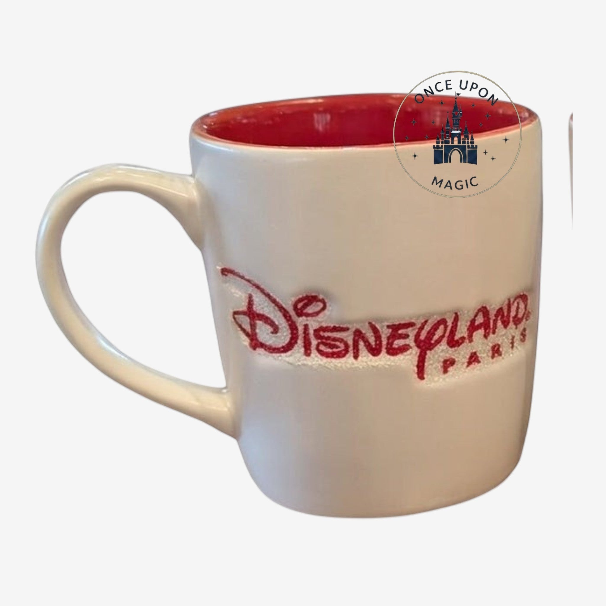 Once Upon Magic white ceramic mug with red interior, featuring Disneyland Paris logo in red glitter.
