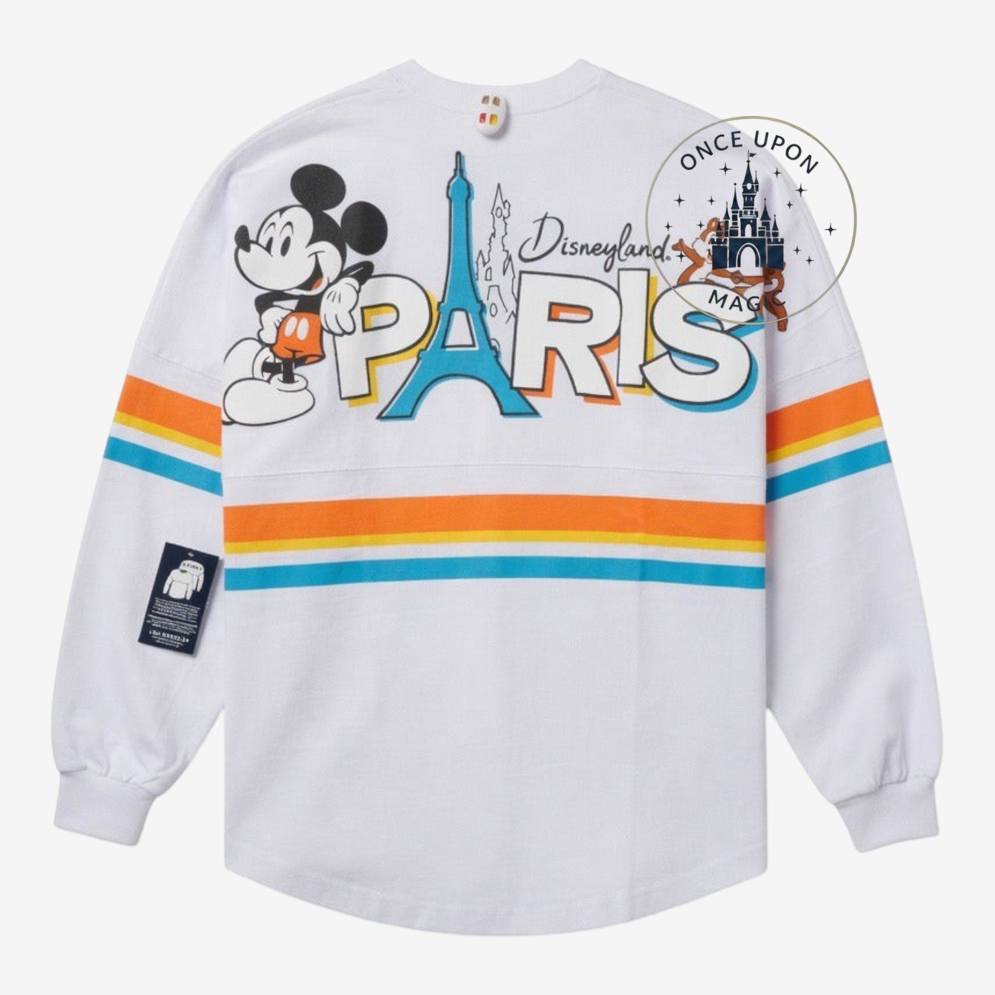 Once Upon Magic white long-sleeve Spirit Jersey with Mickey Mouse and Disneyland Paris text, featuring colorful stripes on sleeves.