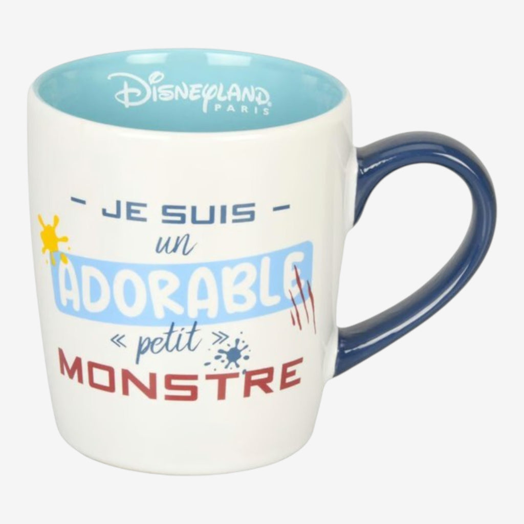 Once Upon Magic Disneyland Paris white ceramic mug with blue interior and navy handle, featuring Stitch text and graphics.