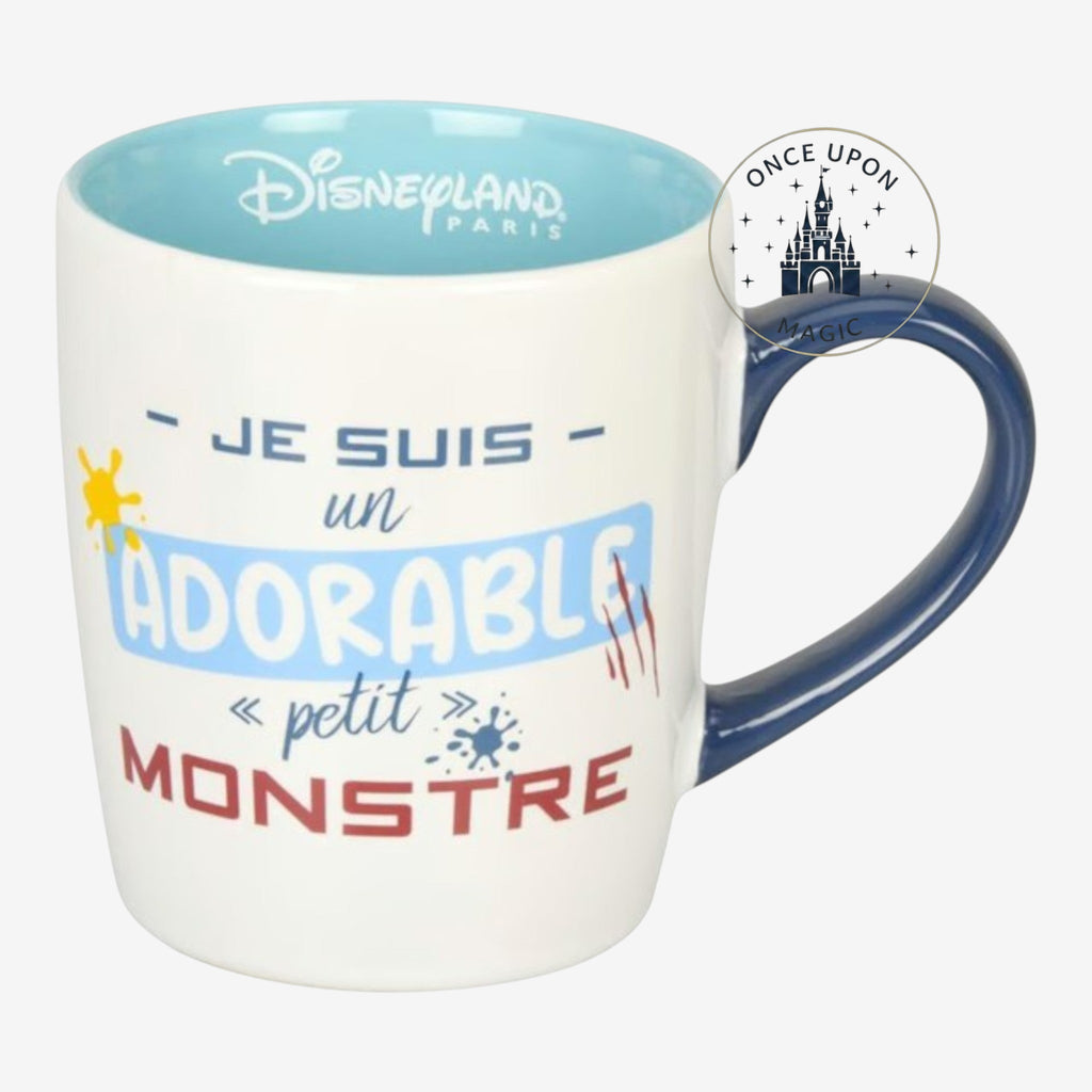 Once Upon Magic Disneyland Paris white ceramic mug with blue interior and navy handle, featuring Stitch text and graphics.