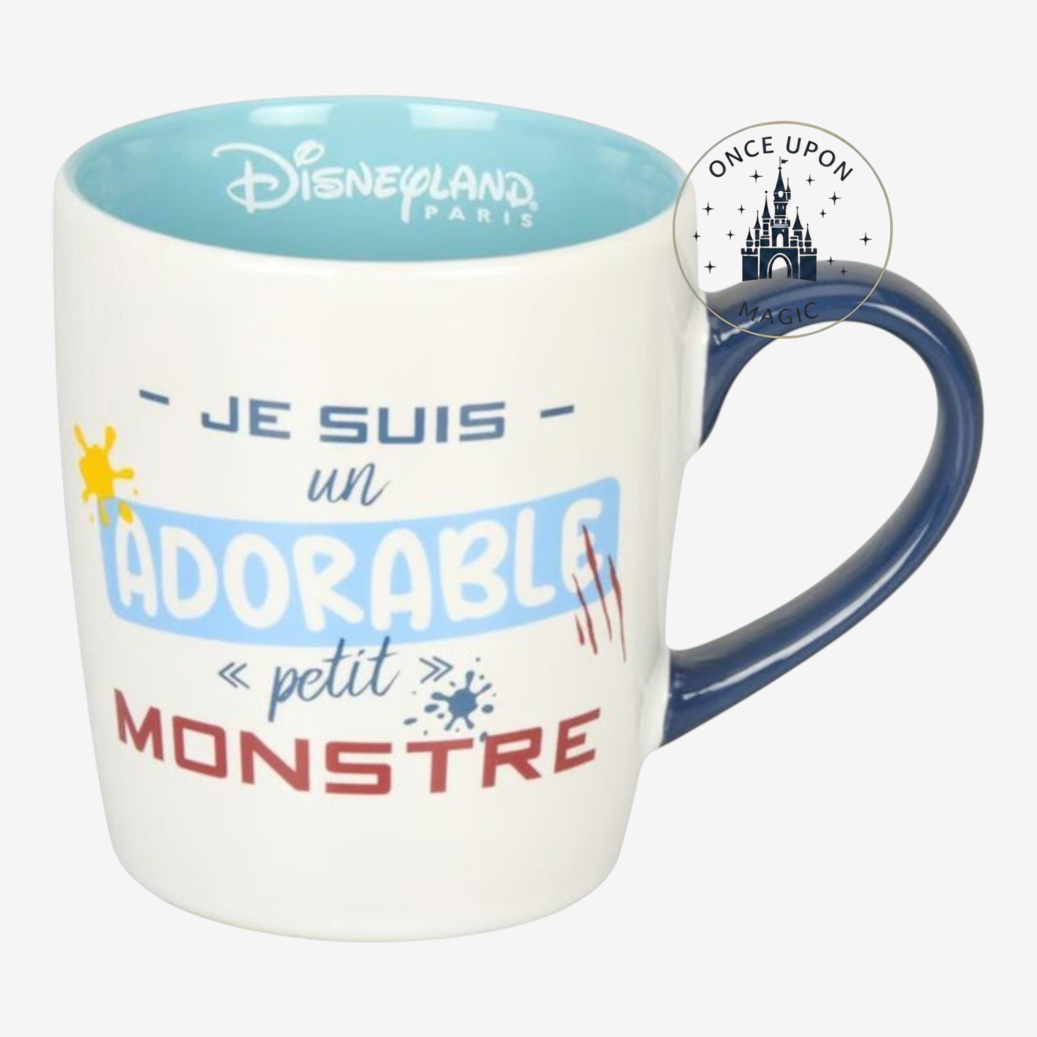 Once Upon Magic Disneyland Paris white ceramic mug with blue interior and navy handle, featuring Stitch text and graphics.