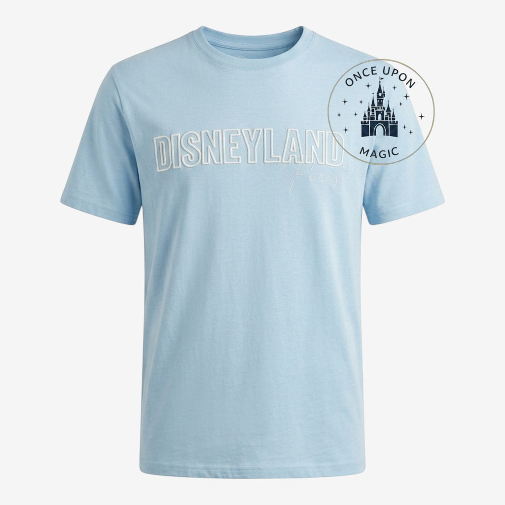 Once Upon Magic light blue cotton t-shirt with Disneyland Paris graphic text on chest