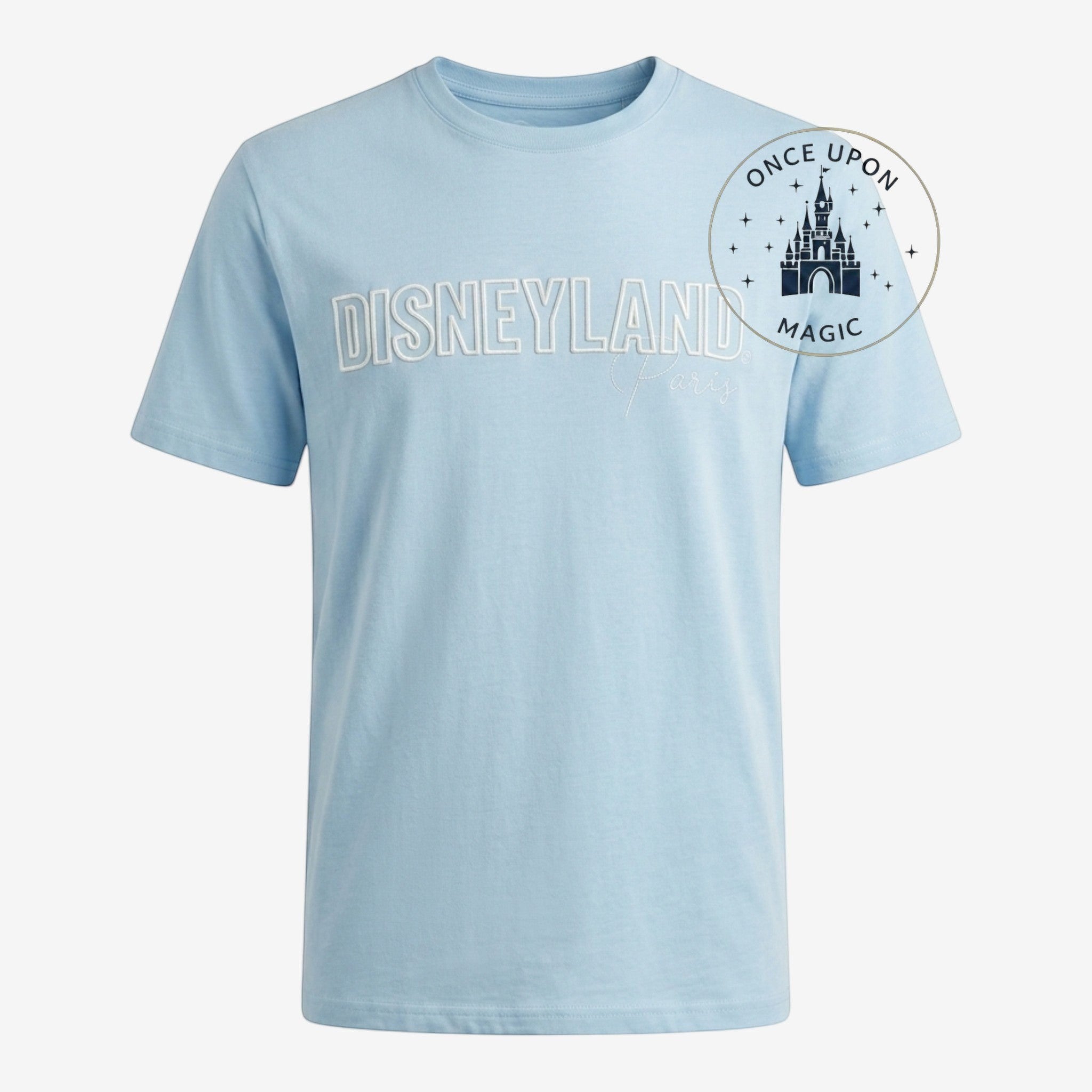 Once Upon Magic light blue cotton t-shirt with embroidered Disneyland Paris text and castle logo. Classic crew neck, short sleeves.