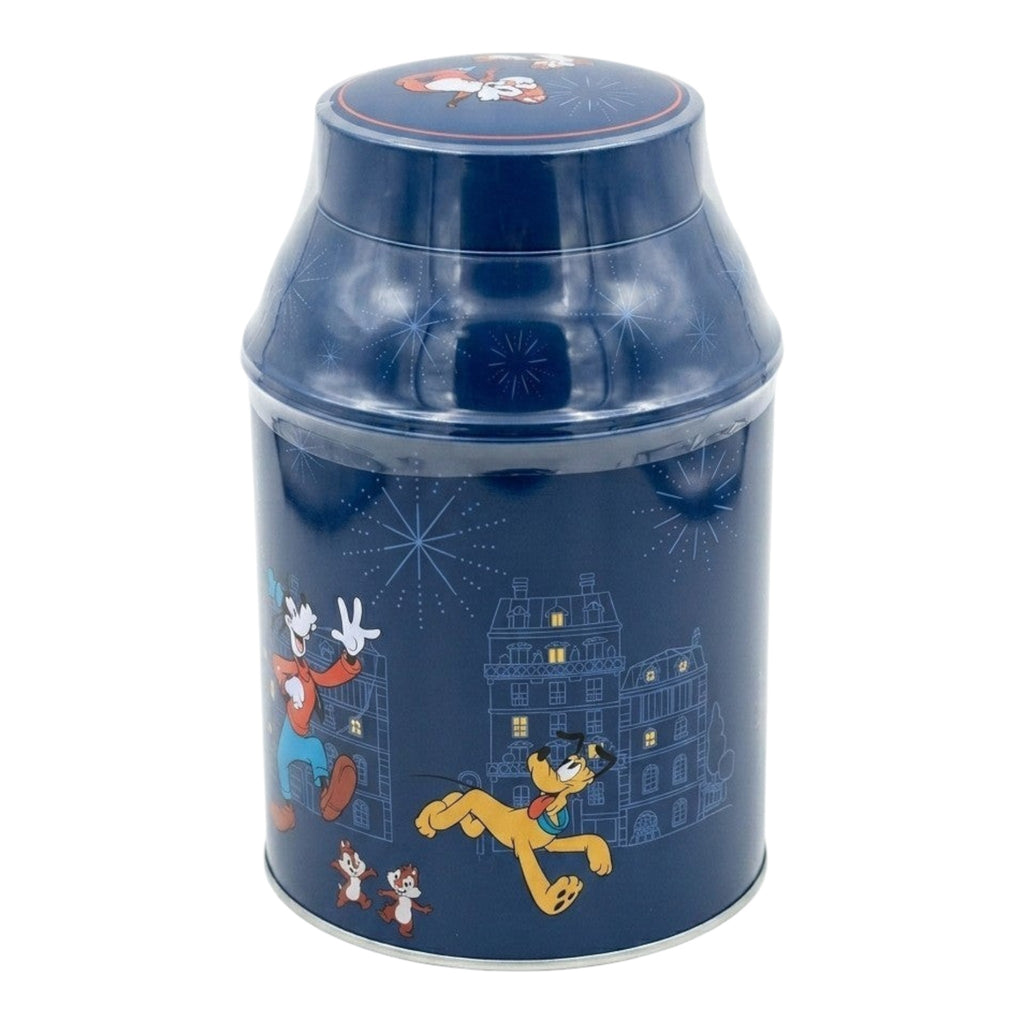 Once Upon Magic Disneyland Paris tin with Mickey & friends, deep blue with cityscape and fireworks design.