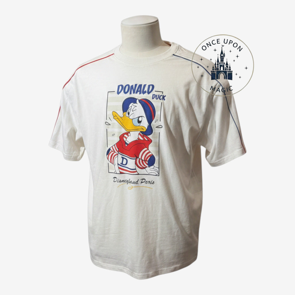 Once Upon Magic white adult t-shirt featuring a Donald Duck graphic print and Disneyland Paris branding.