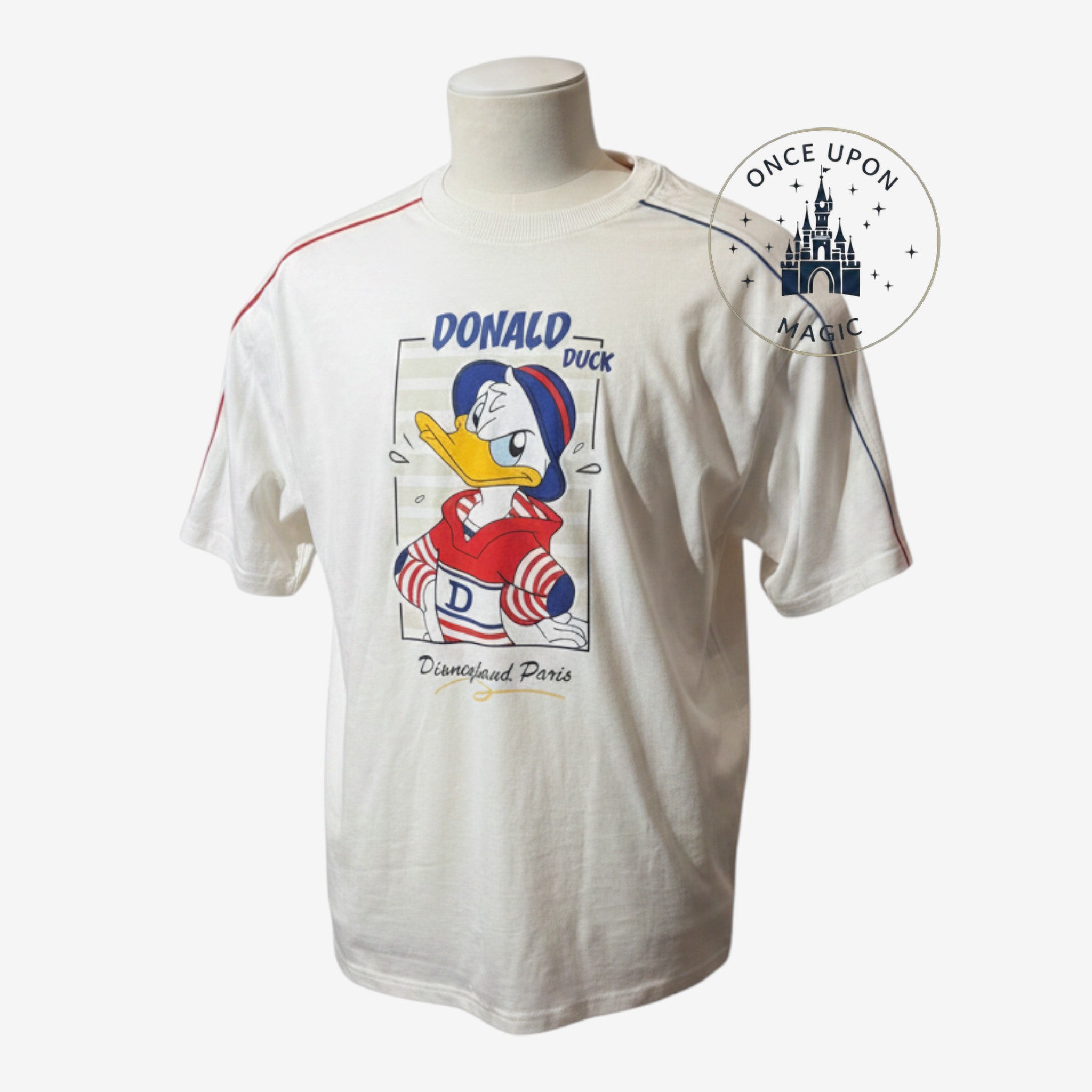 Once Upon Magic white adult t-shirt featuring a Donald Duck graphic print and Disneyland Paris branding.