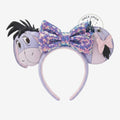 Once Upon Magic Eeyore ears headband with purple sequin bow and pink bow detail. Soft purple and grey.