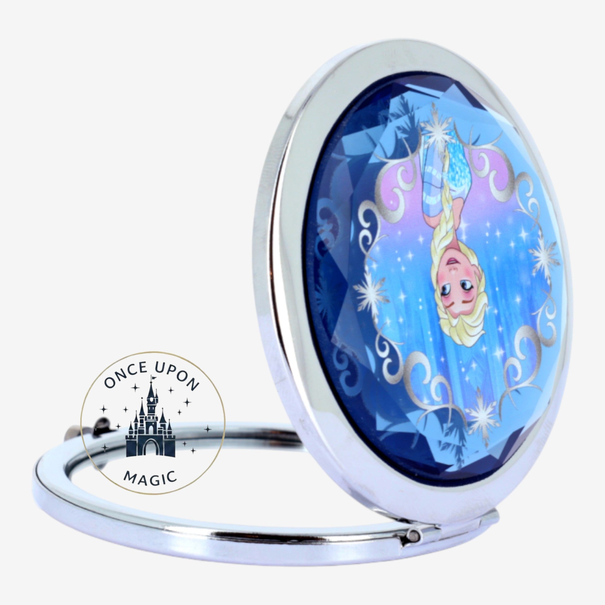 Once Upon Magic Elsa compact mirror with silver finish and blue sparkling winter design. Features Elsa illustration.