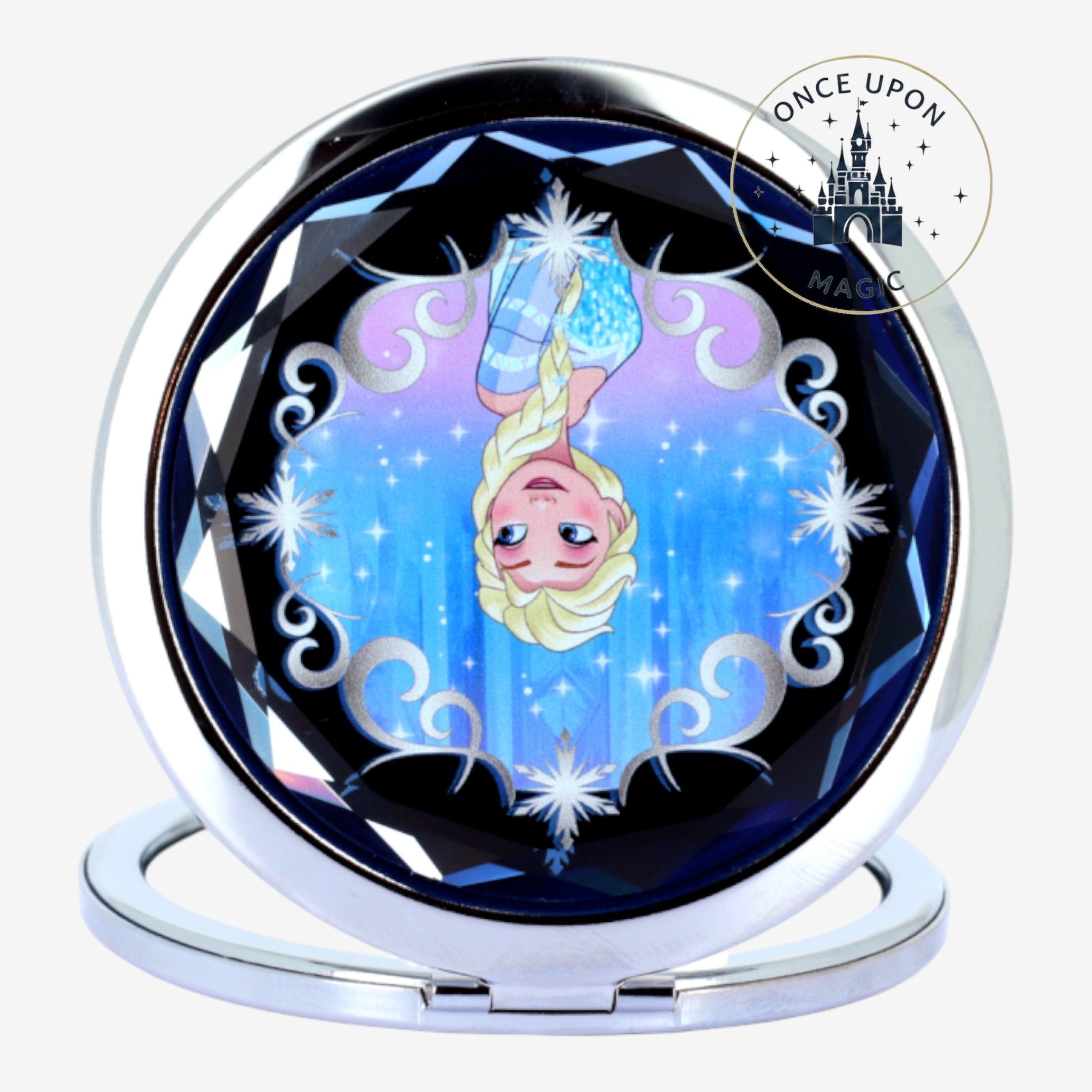 Once Upon Magic Elsa compact mirror with silver finish and blue, sparkling winter design. Features Elsa illustration.