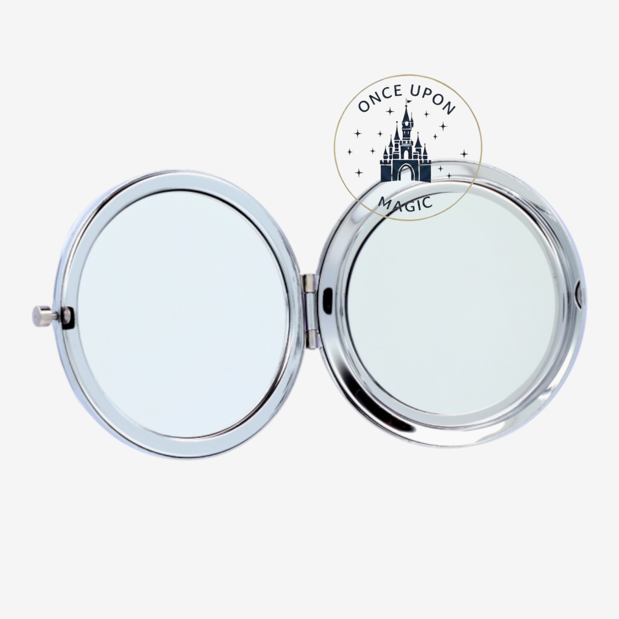 Once Upon Magic silver compact mirror featuring Elsa from Frozen, with a wintery blue design. Perfect for makeup touch-ups.