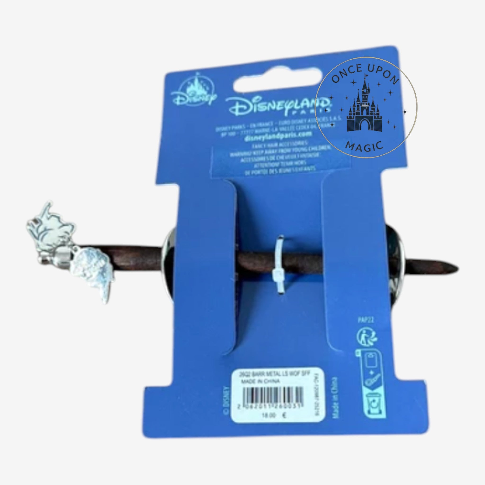 Once Upon Magic Elsa hair barrette with snowflake design and icy blue metallic details. Features a small dangling charm.