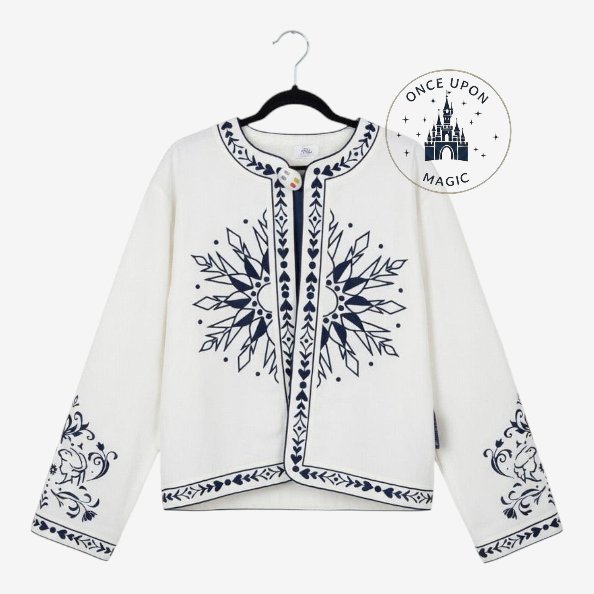 Once Upon Magic off-white knit cardigan jacket with navy blue snowflake and floral embroidery and single button closure