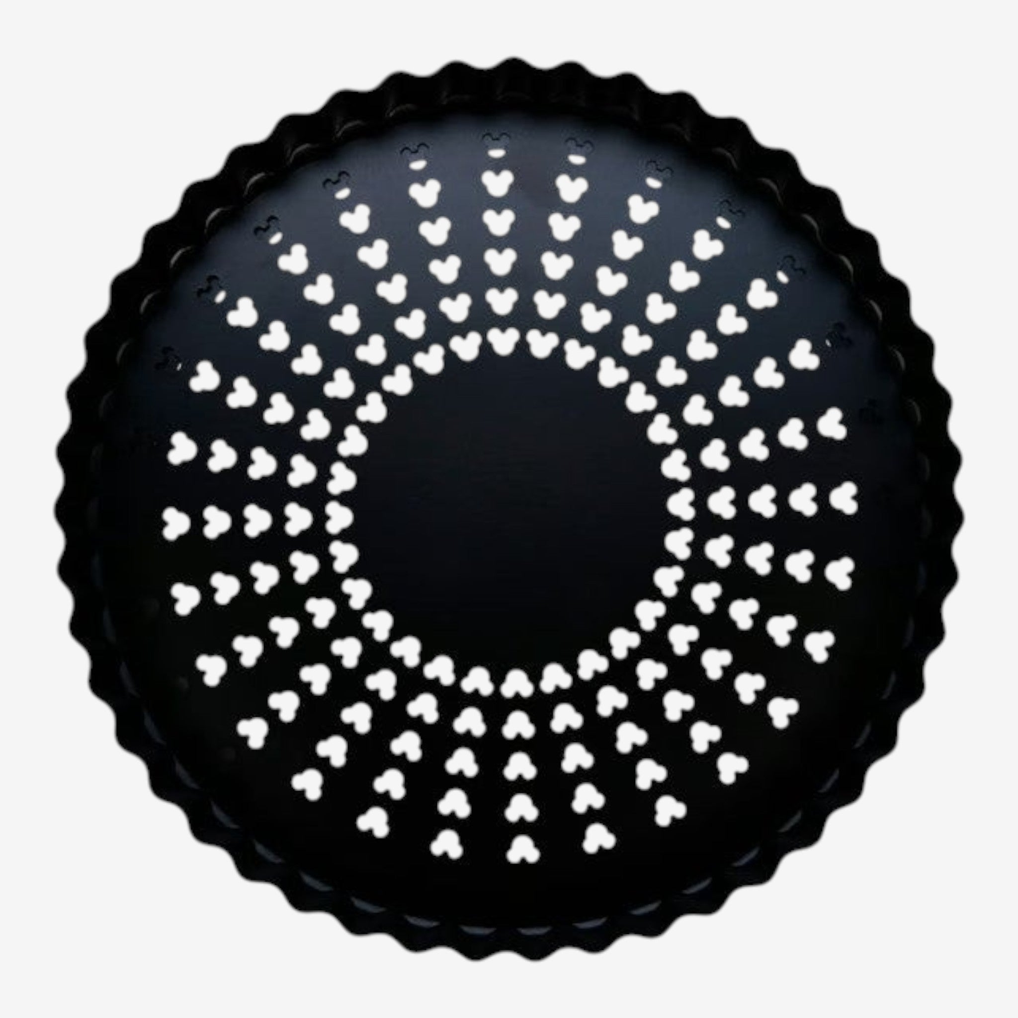 Once Upon Magic black fluted tart pan with removable bottom and perforated surface for even baking.