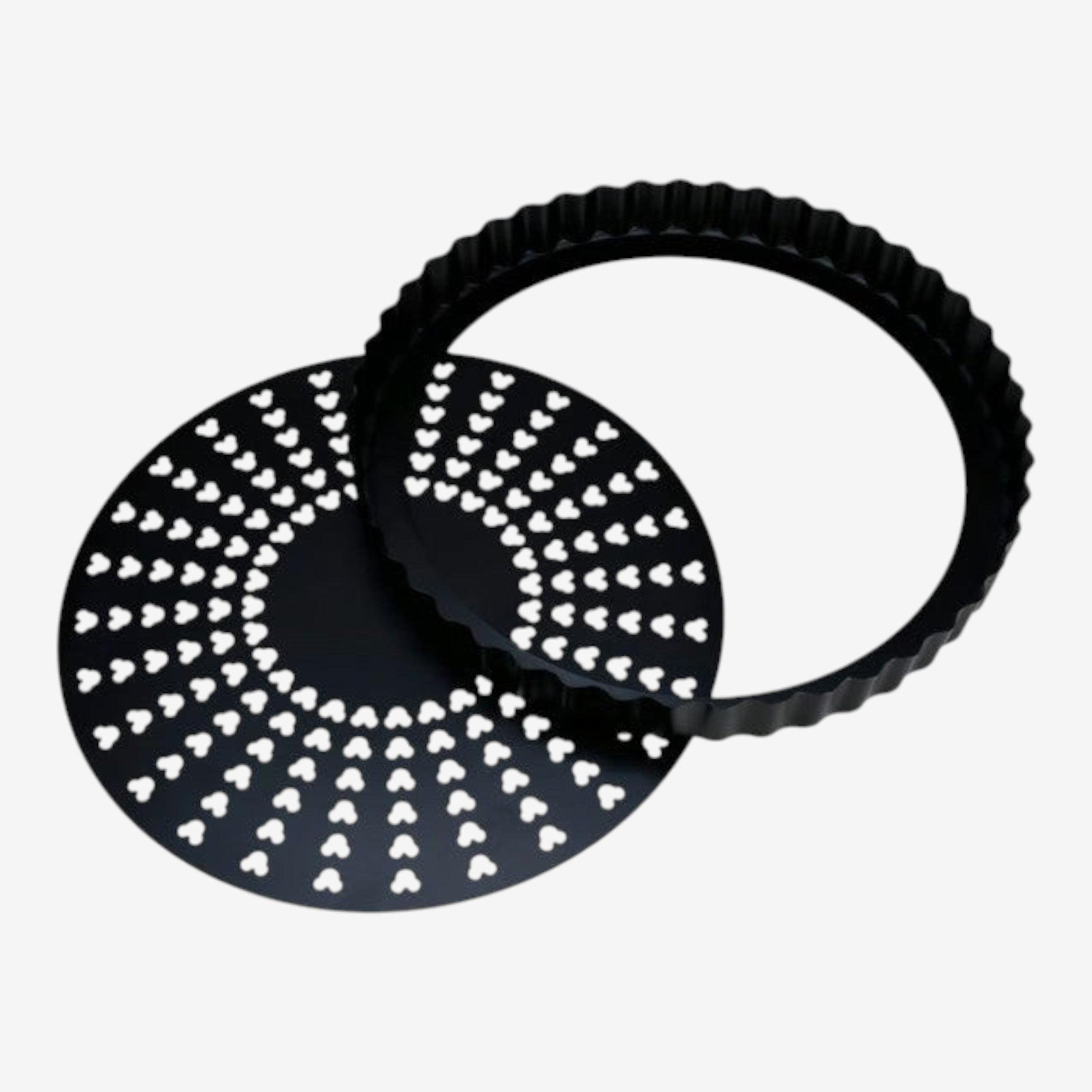 Once Upon Magic black non-stick fluted tart pan with removable bottom and perforated base for even baking.