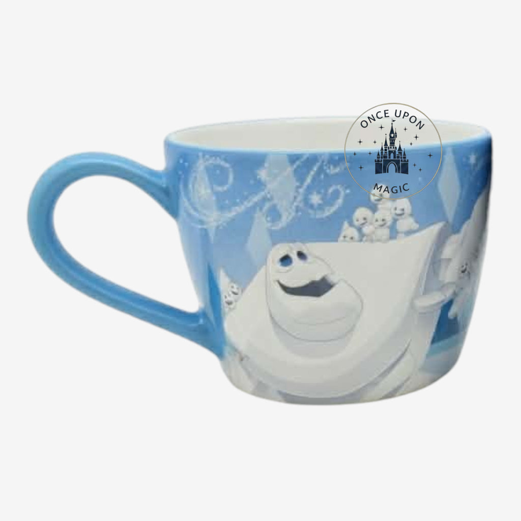 Once Upon Magic blue ceramic mug featuring Olaf and snowgies from Frozen in a winter scene. Perfect for hot beverages.