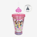 Gobelet Once Upon Magic avec paille, couvercle rose et princesses Disney, fond pailleté et couronne en relief.