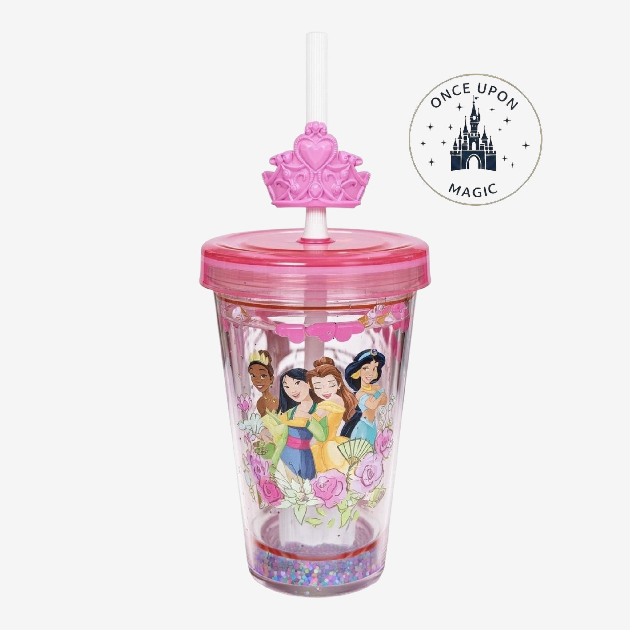 Gobelet Once Upon Magic avec paille, couvercle rose et princesses Disney, fond pailleté et couronne en relief.