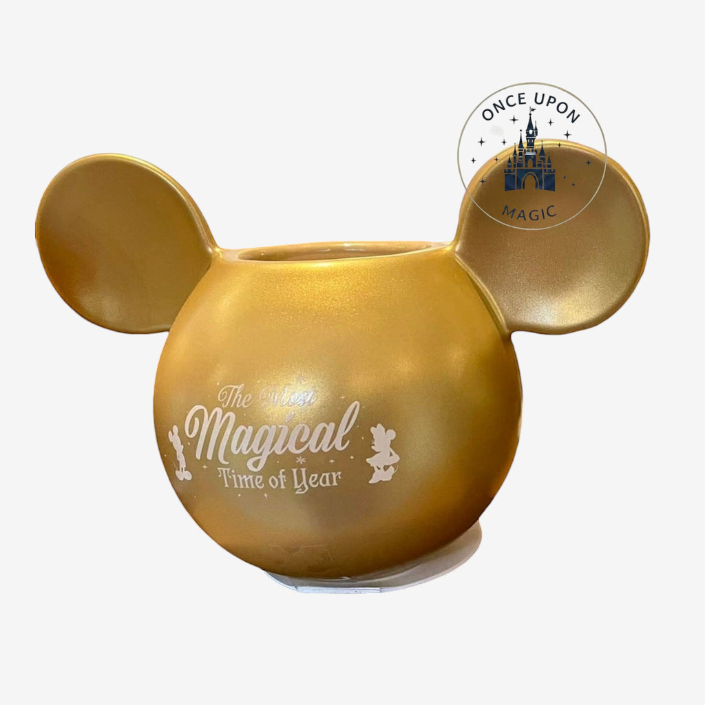 Once Upon Magic metallic gold ceramic mug with iconic ear-shaped design and The Most Magical Time of Year text