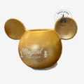 Once Upon Magic metallic gold ceramic mug with iconic ear-shaped design and The Most Magical Time of Year text