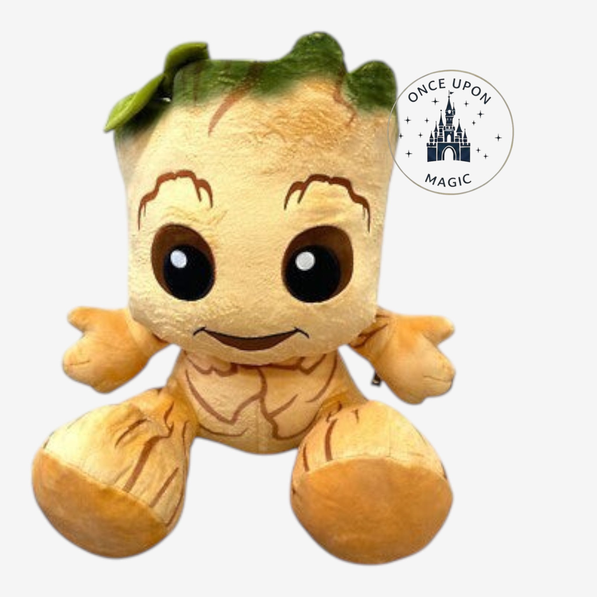 Once Upon Magic Big Big Feet Groot plush toy with large feet, soft tan fabric, and green leaf detail on head.