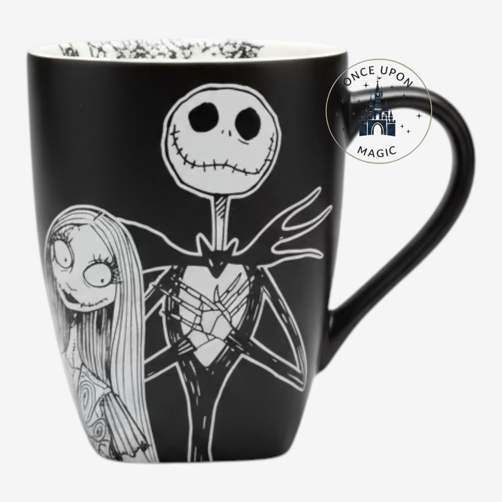 Once Upon Magic black ceramic mug featuring Jack Skellington and Sally from The Nightmare Before Christmas