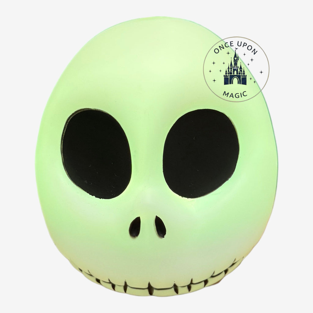 Once Upon Magic Jack Skellington mood light with a pale green glow and iconic stitched smile face design.