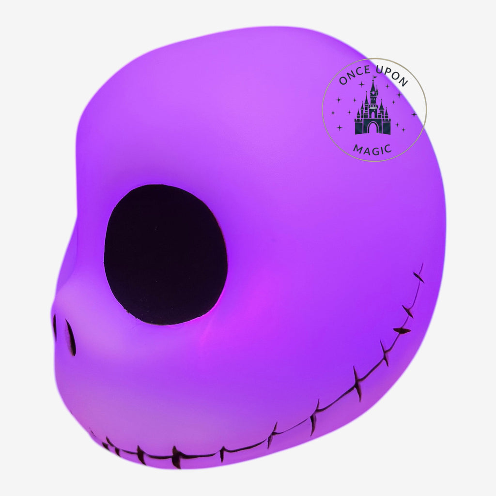 Once Upon Magic Jack Skellington mood light glowing in vibrant purple, featuring his iconic stitched smile and eyes.