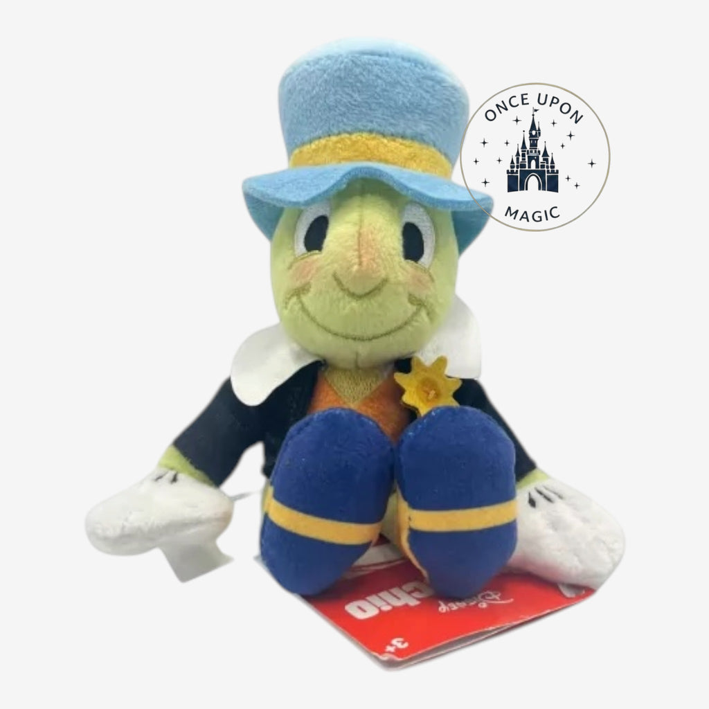 Once Upon Magic Jiminy Cricket shoulder plush wearing a blue hat, black jacket, and gold star badge from Pinocchio.