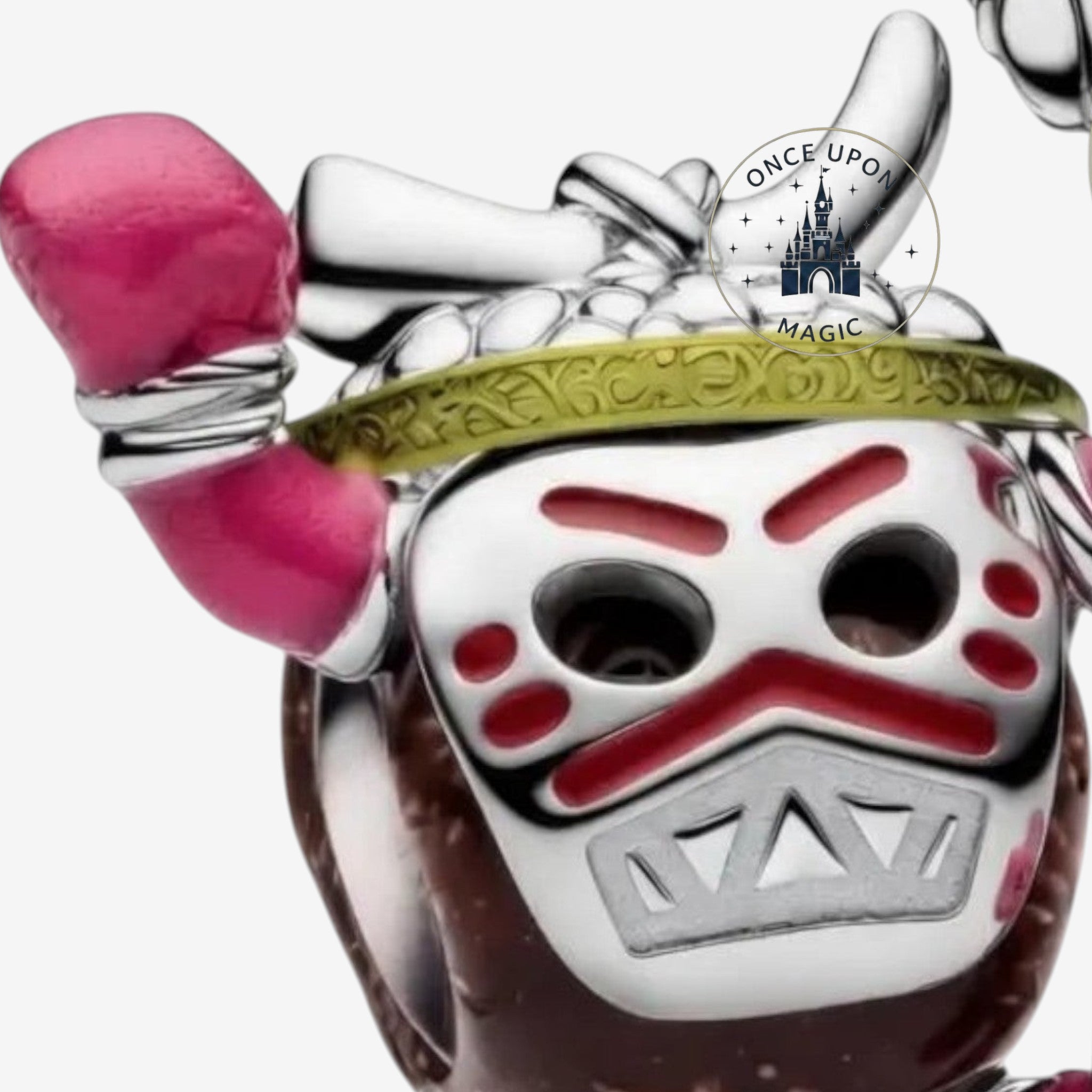 Once Upon Magic Kakamora charm made of natural coconut fiber, featuring pink and silver details, inspired by Disney's Moana.