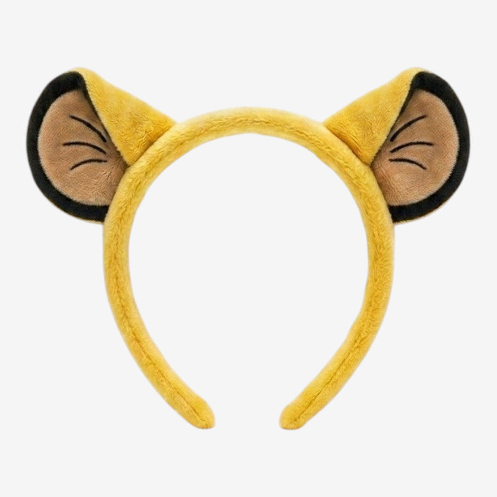 Once Upon Magic yellow plush lion cub ears headband with tan inner ears and black trim. Costume accessory.