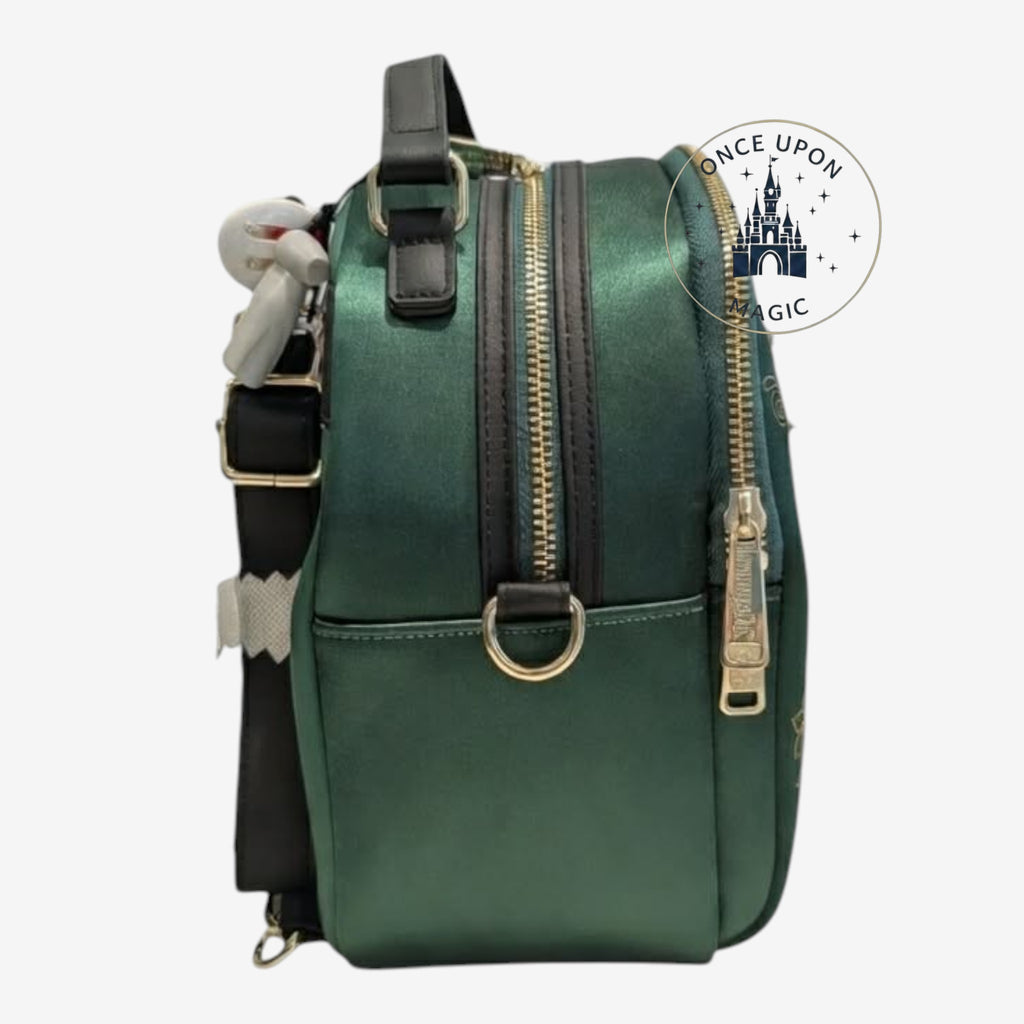 Once Upon Magic emerald green faux leather Loki mini backpack with gold details and zip closure.