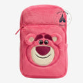 Once Upon Magic Lotso plush crossbody bag in vibrant pink with embroidered Toy Story bear face and zippered pocket.