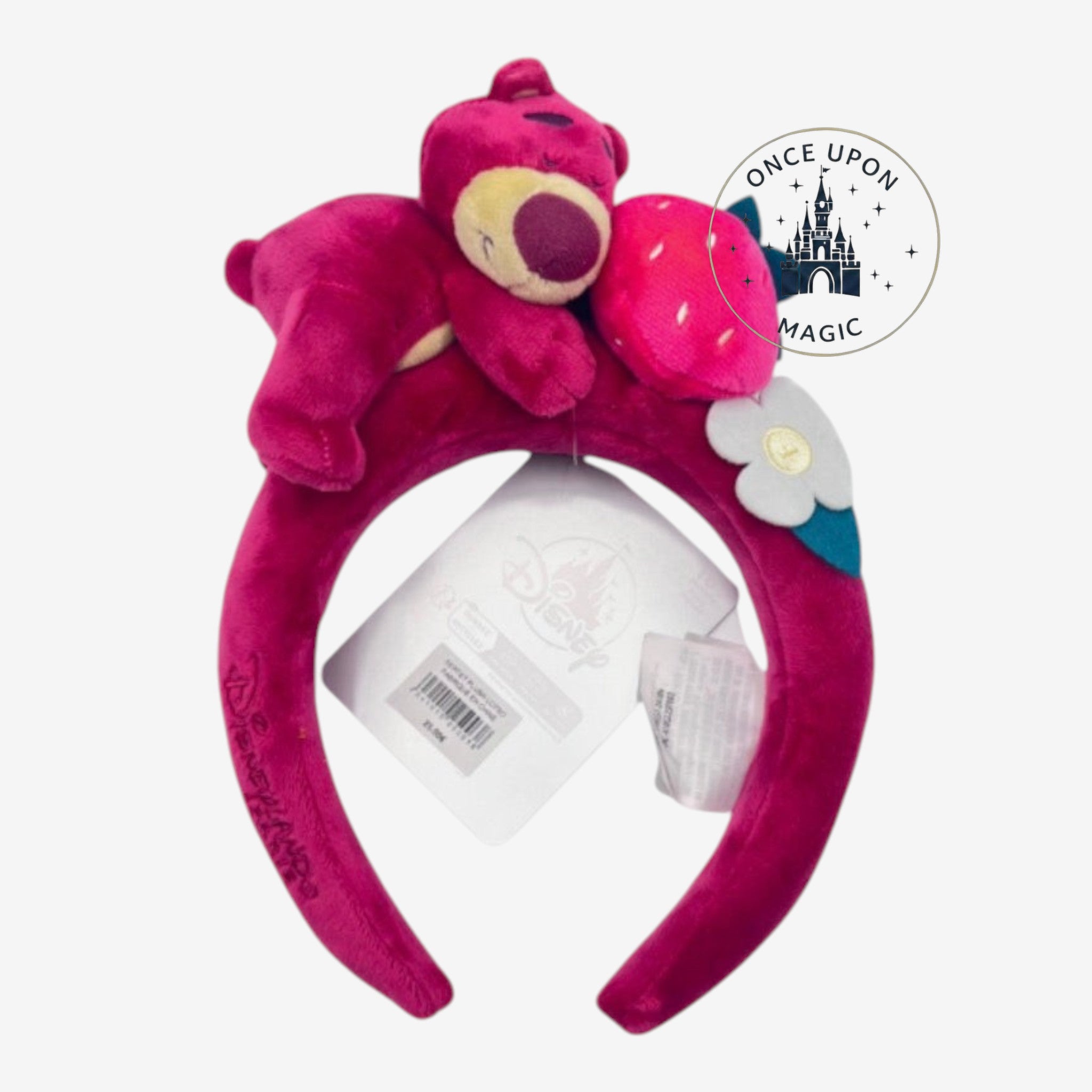 Once Upon Magic Disney Lotso plush headband in magenta velvet with strawberry and flower character details.