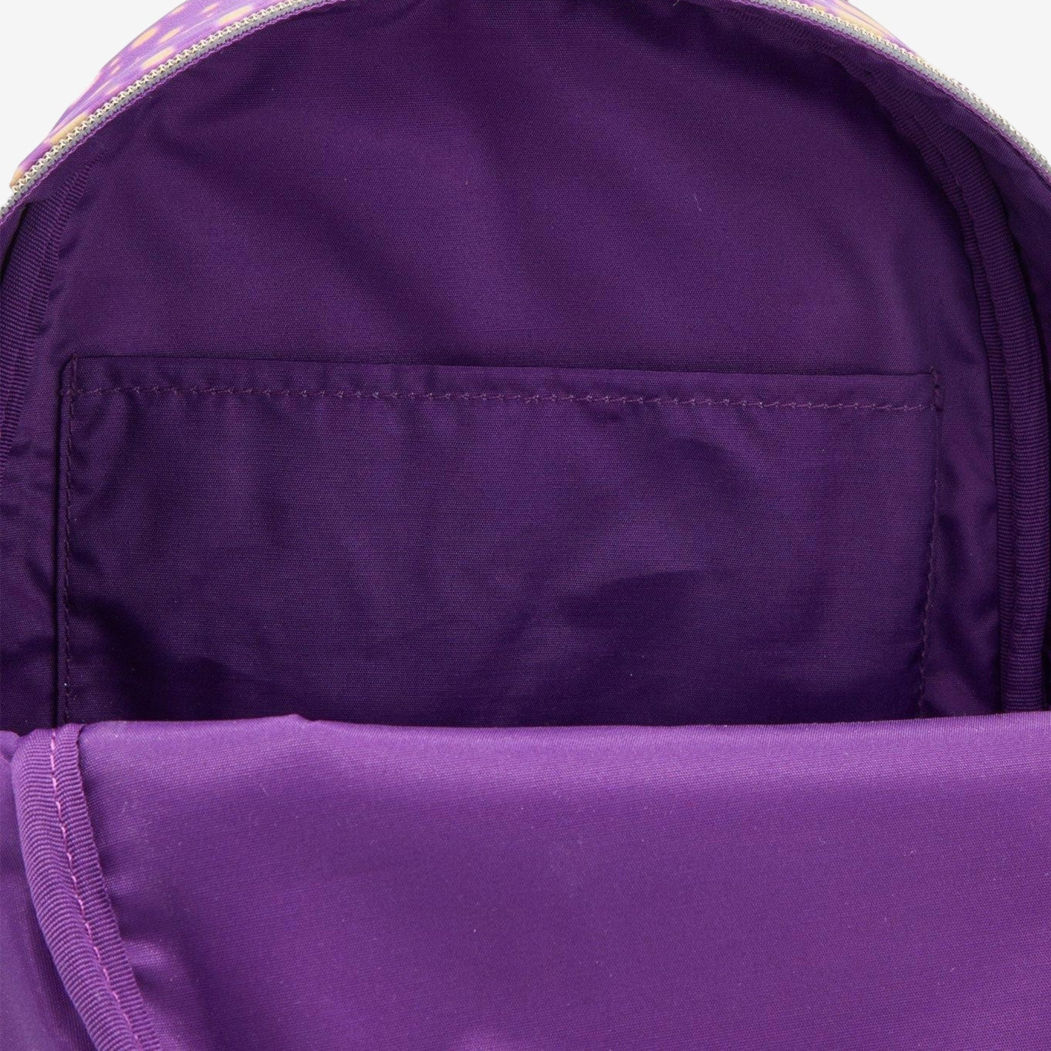 Once Upon Magic Loungefly Disney Rapunzel Night of the Lanterns mini backpack interior with purple lining and pocket.