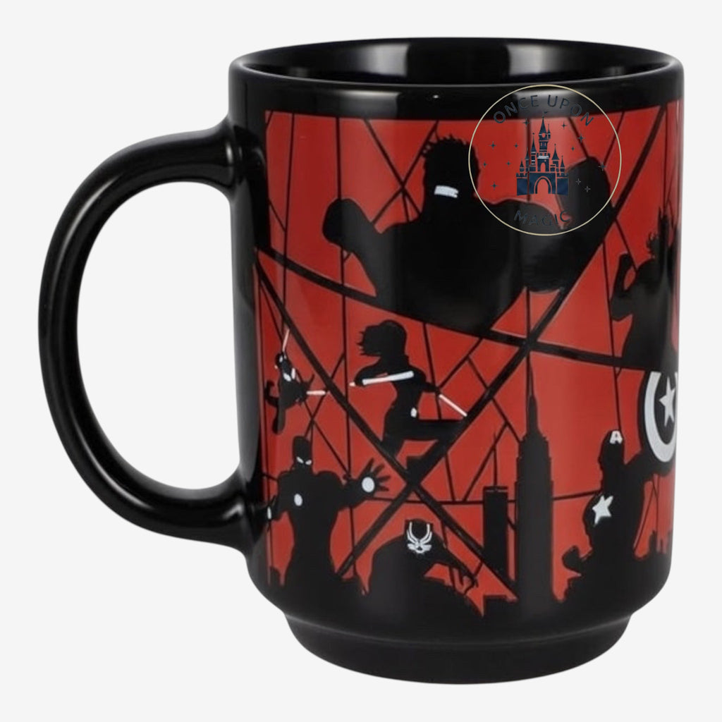 Once Upon Magic black ceramic mug featuring Marvel superhero silhouettes and NYC skyline on a red background.