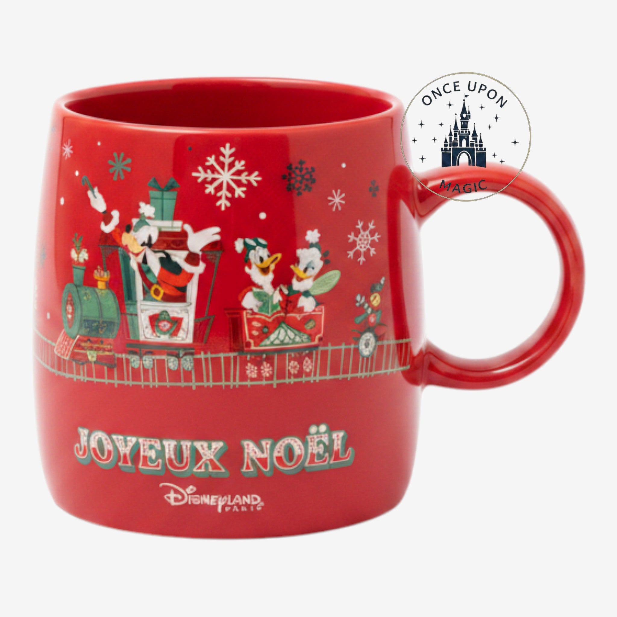 Once Upon Magic red Christmas mug featuring Mickey and Friends, winter train illustrations, and Joyeux Noël text.