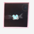 Once Upon Magic Mickey Mouse 2026 commemorative charm with shimmering blue enamel in a pink gift box.