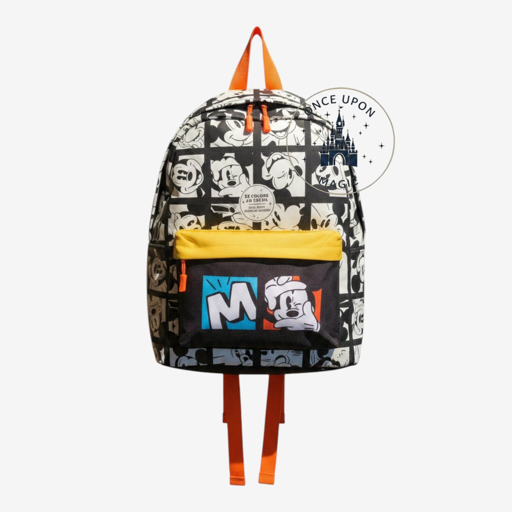 Once Upon Magic Mickey Mouse backpack with black and white comic print, yellow front pocket, and orange straps.