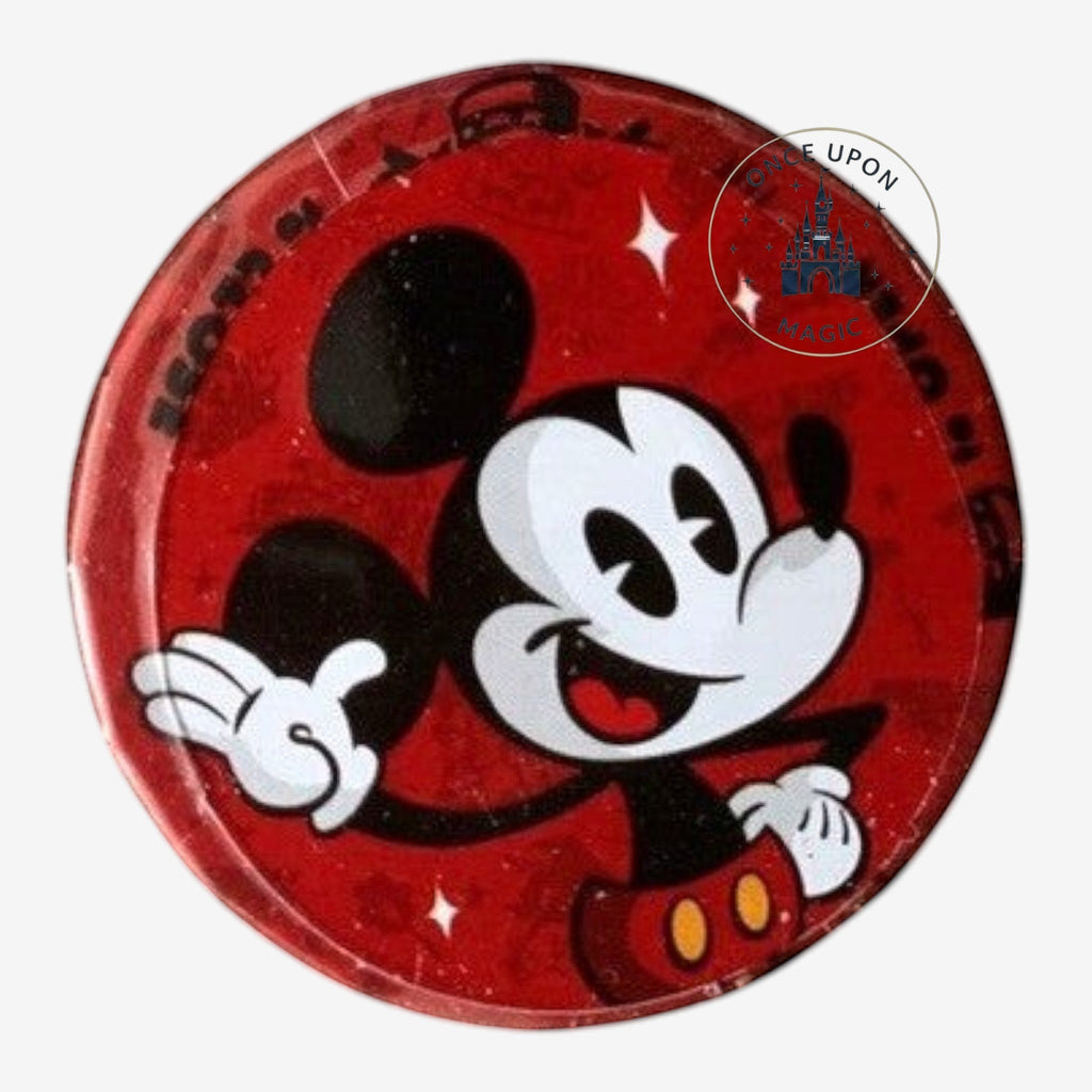 Once Upon Magic red tin candy box featuring Mickey Mouse in a classic pose with white gloves and red shorts.