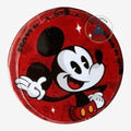 Once Upon Magic red tin candy box featuring Mickey Mouse in a classic pose with white gloves and red shorts.