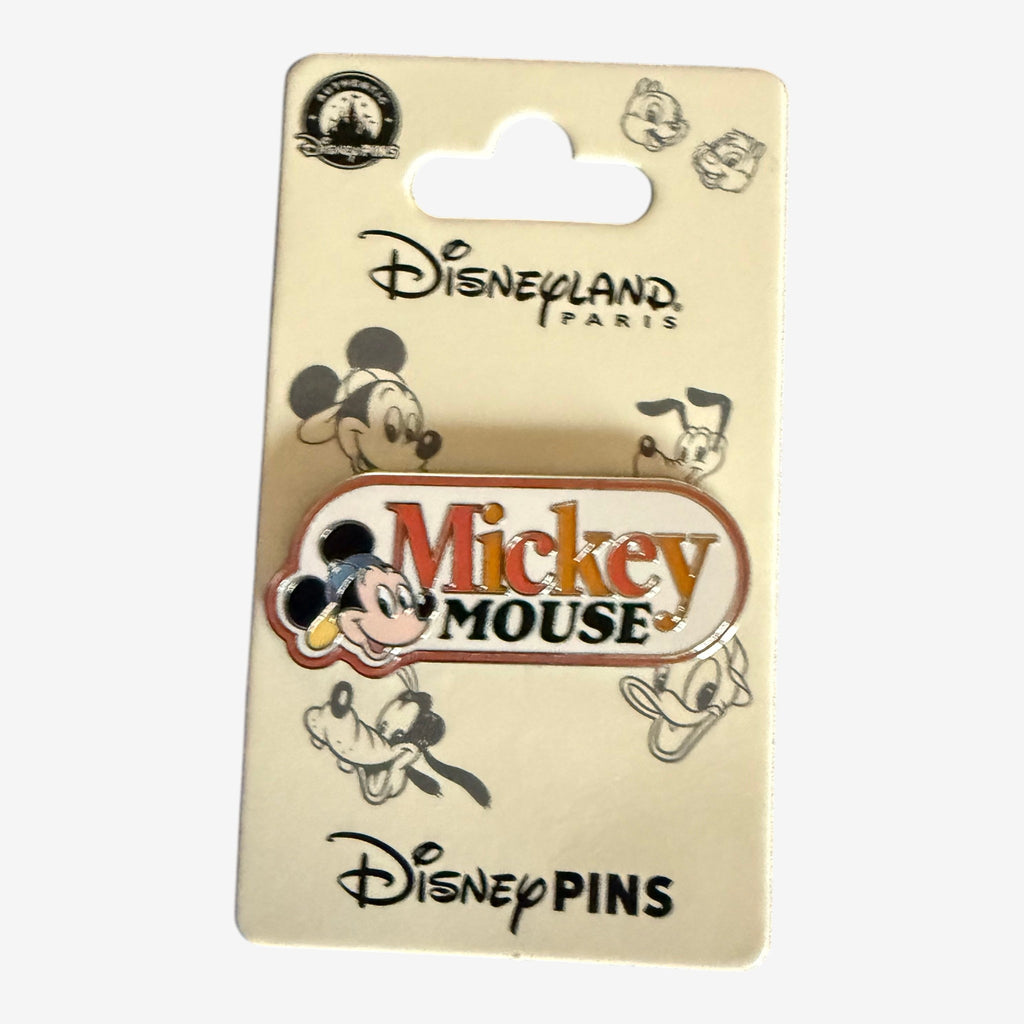 Once Upon Magic Disneyland Paris Mickey Mouse logo enamel pin with character illustration and colorful text.