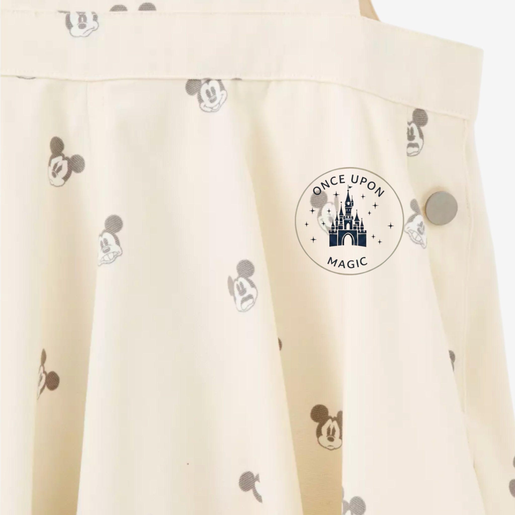 Once Upon Magic cream short overalls with all-over Mickey Mouse print and silver button detail.
