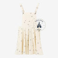Once Upon Magic cream cotton blend overall shorts with all-over Mickey Mouse print, adjustable straps, and button sides.
