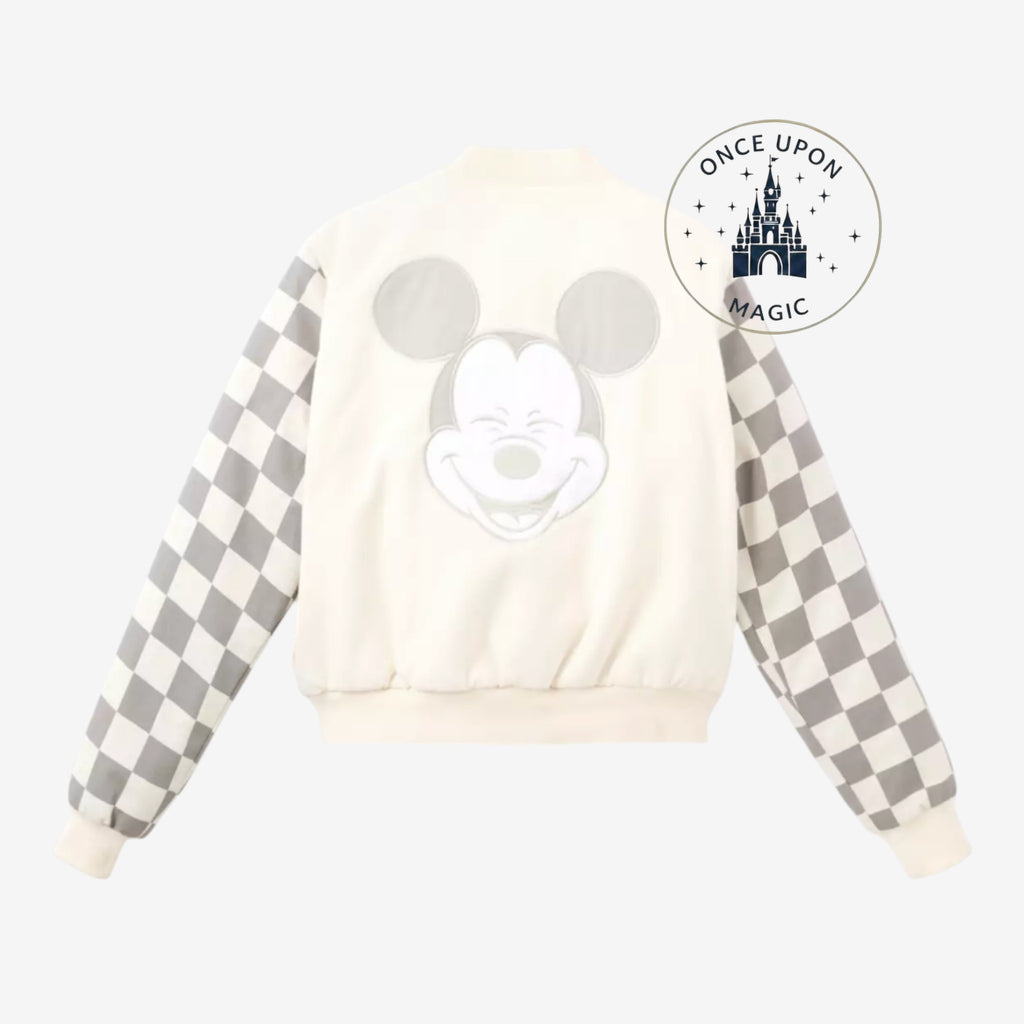 Once Upon Magic cream teddy varsity jacket with grey checkered sleeves and a large Mickey Mouse face on the back.