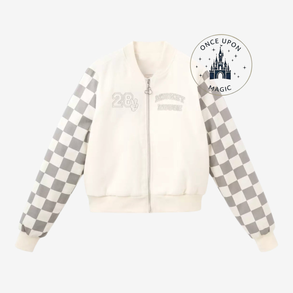 Once Upon Magic cream teddy varsity jacket with grey checkered sleeves and "Mickey Mouse" embroidery.