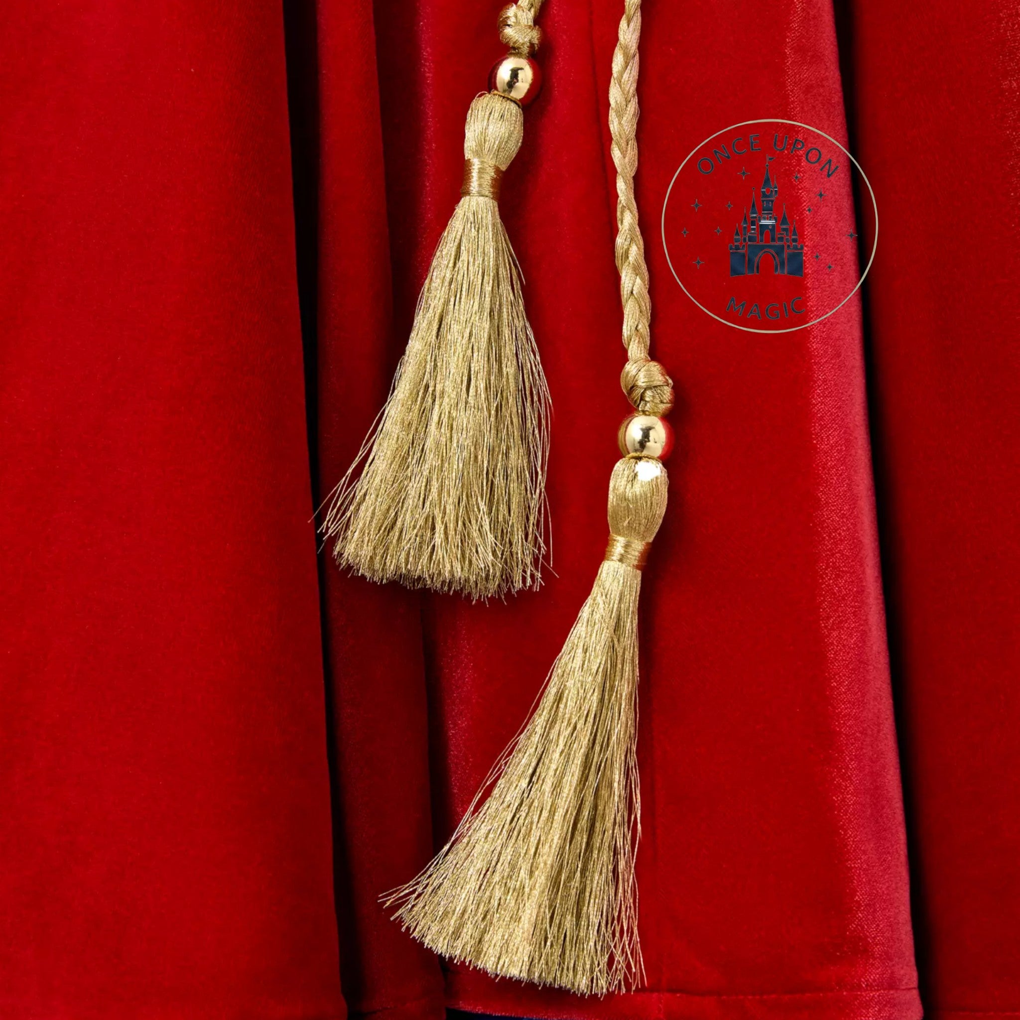Once Upon Magic Mickey Sorcier Fantasia dress featuring a deep burgundy velvet fabric and a braided gold tassel belt.