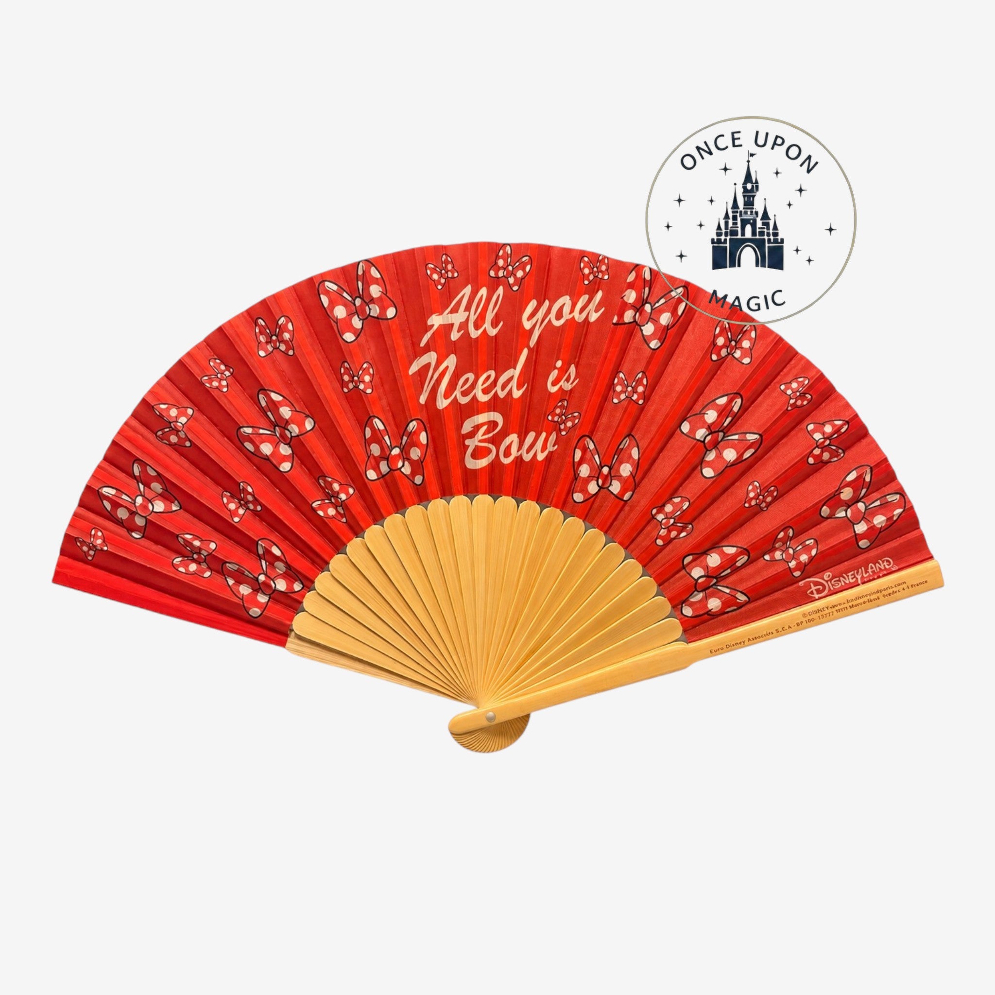 Once Upon Magic red folding fan with white polka dot Minnie Mouse bows and "All you Need is Bow" text. Natural wood handle.