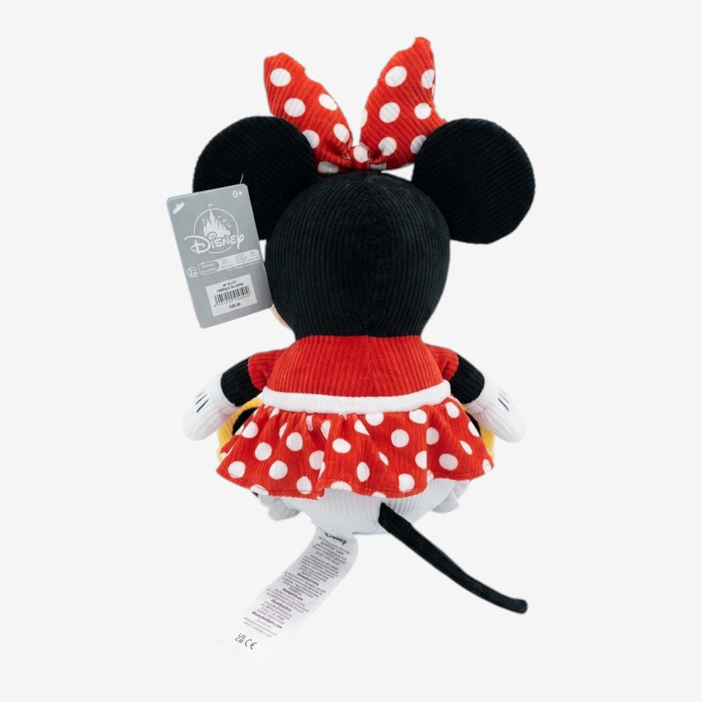 Once Upon Magic Minnie Mouse corduroy plush toy in red polka dot dress and bow, black ears, white gloves, and yellow shoes.